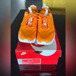 Nike Air Max. Size 7 like new! Orange color. Used one time.